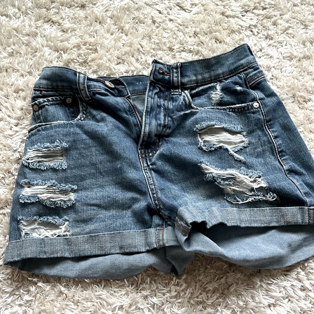Blue jeans shorts with rips